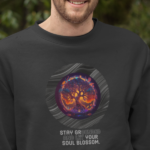 Unisex sweatshirt with beautiful vibrant graphic of tree and message about stay grounded