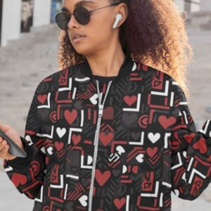girl wearing black bomber jacket printed heart and random shapes pattern